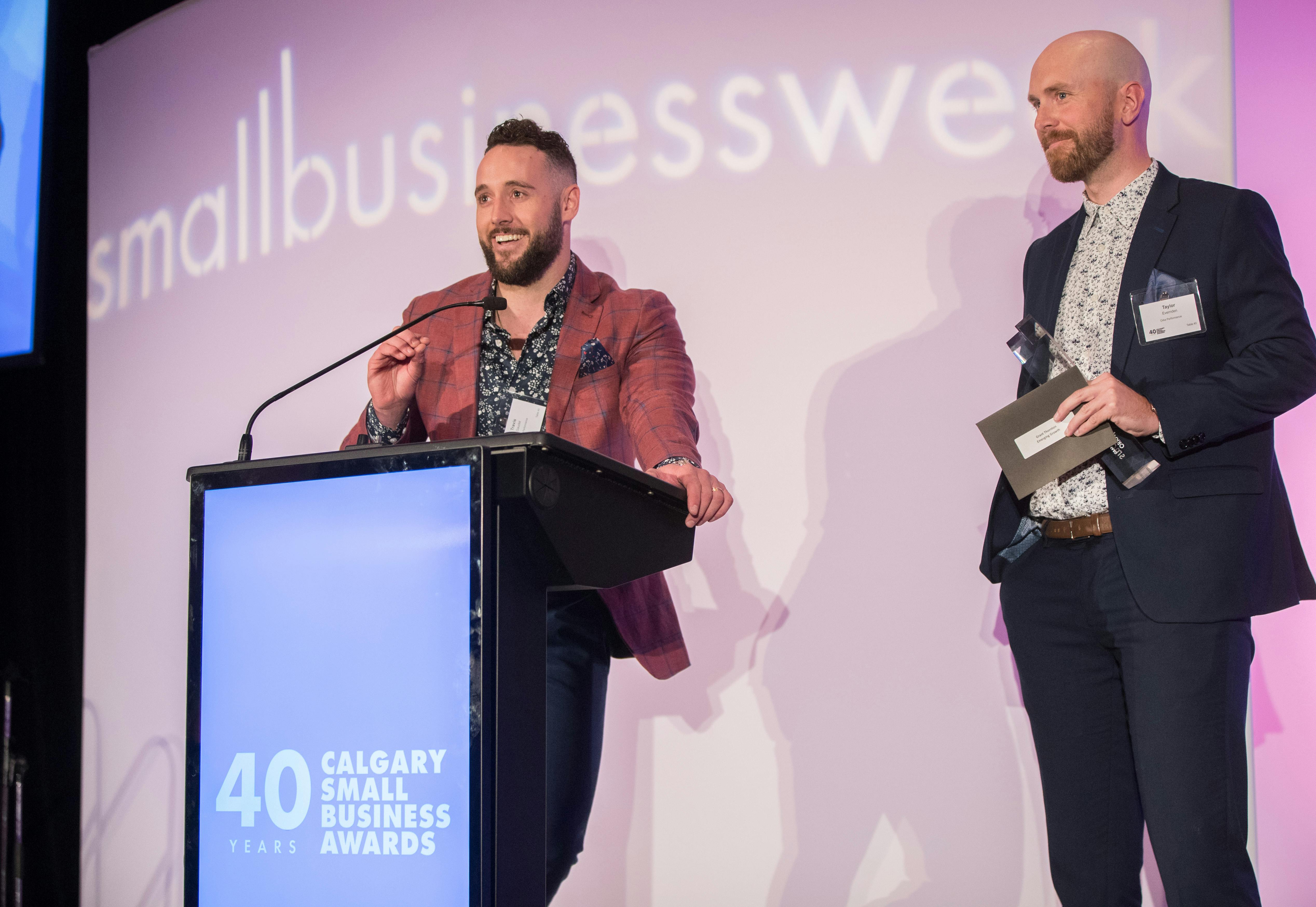 ORKA Performance co-owners accepting their award.