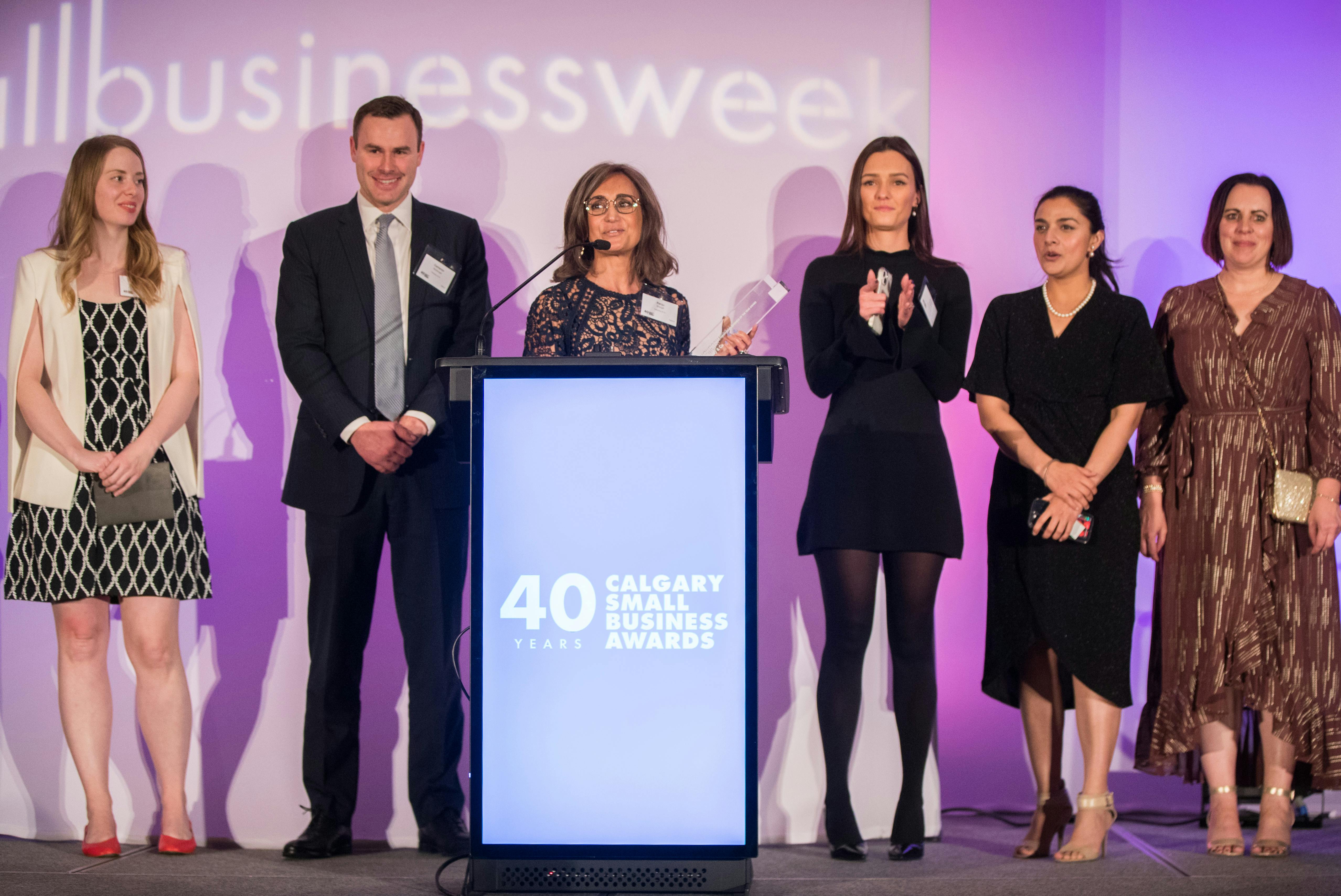 Pekarsky & Co. accepting award at 40th Calgary Small Business Awards.